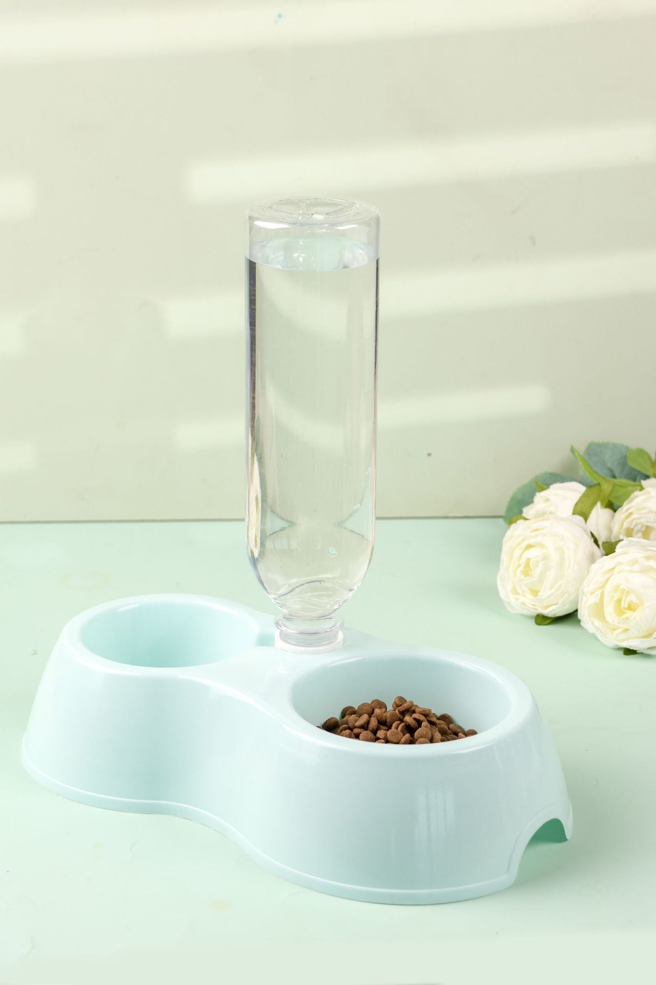 Dual-purpose pet water and food dispenser for cats