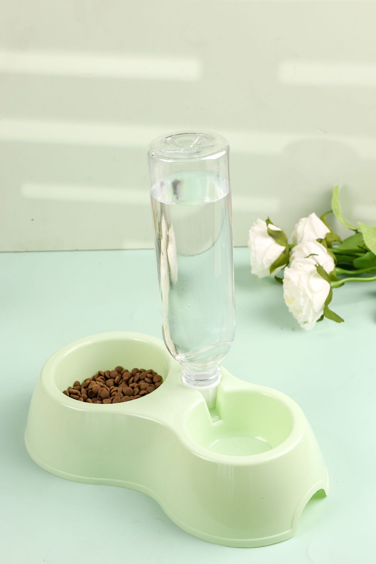 Dual-purpose pet water and food dispenser for cats