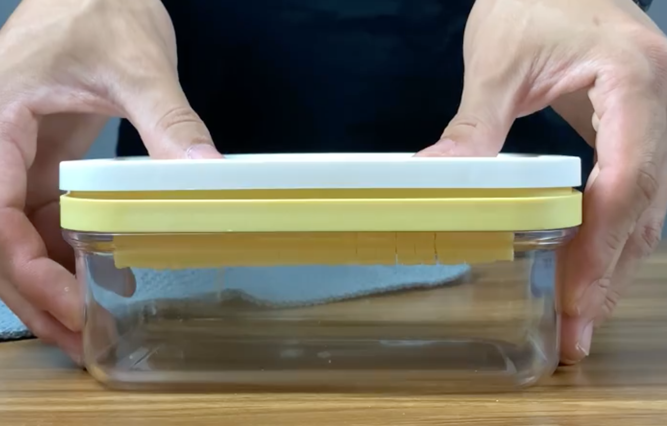 Cheese cutter and storage container